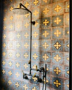 featured image showing - Elan Vital Collection against hand painted tile in golden light