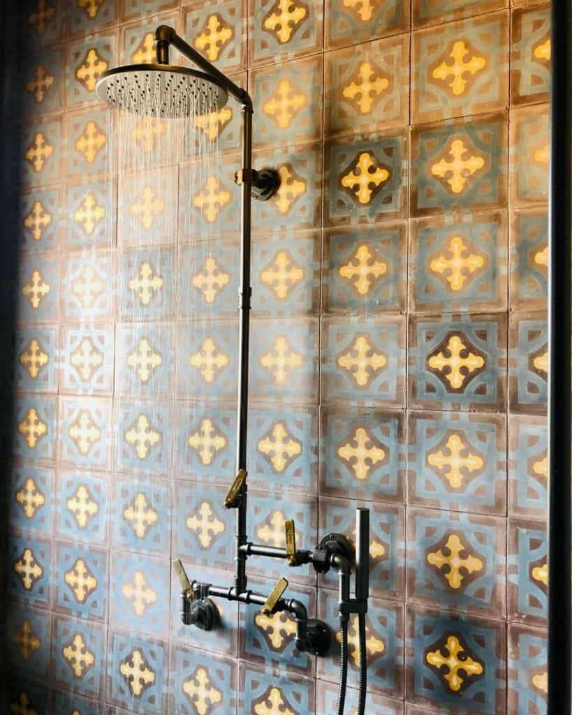 featured image showing - Elan Vital Collection against hand painted tile in golden light