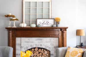 featured image showing a stylish fall decorated mantel