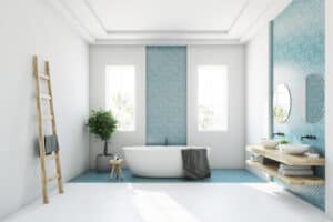 Featured image showing a modern bathroom with a stand alone tub custom tile and pop of color