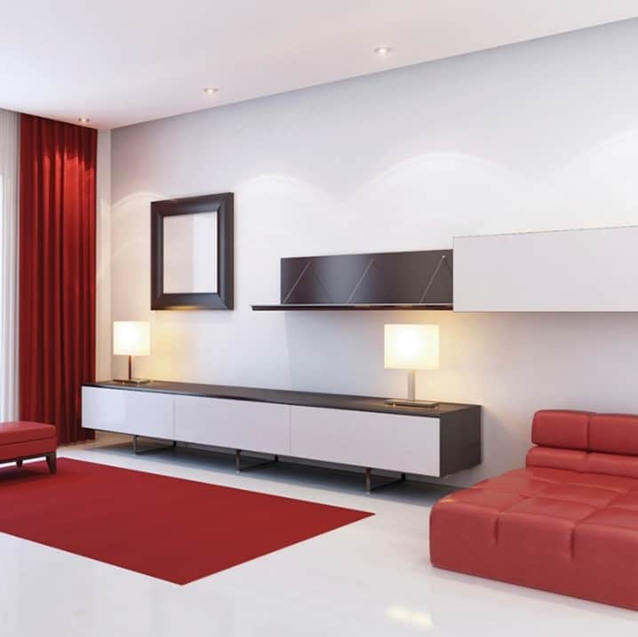 Inline image showing products by Ez Concept incorporated into a modern minimalistic entertainment room in with low profile decor. EzyPelmet recessed pelmets aid in the minimalist interior finish of the living room.