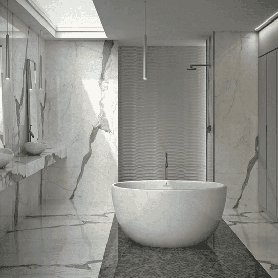 Inline image showing a free standing soaking tub in a modern bathroom with marble walls and floors