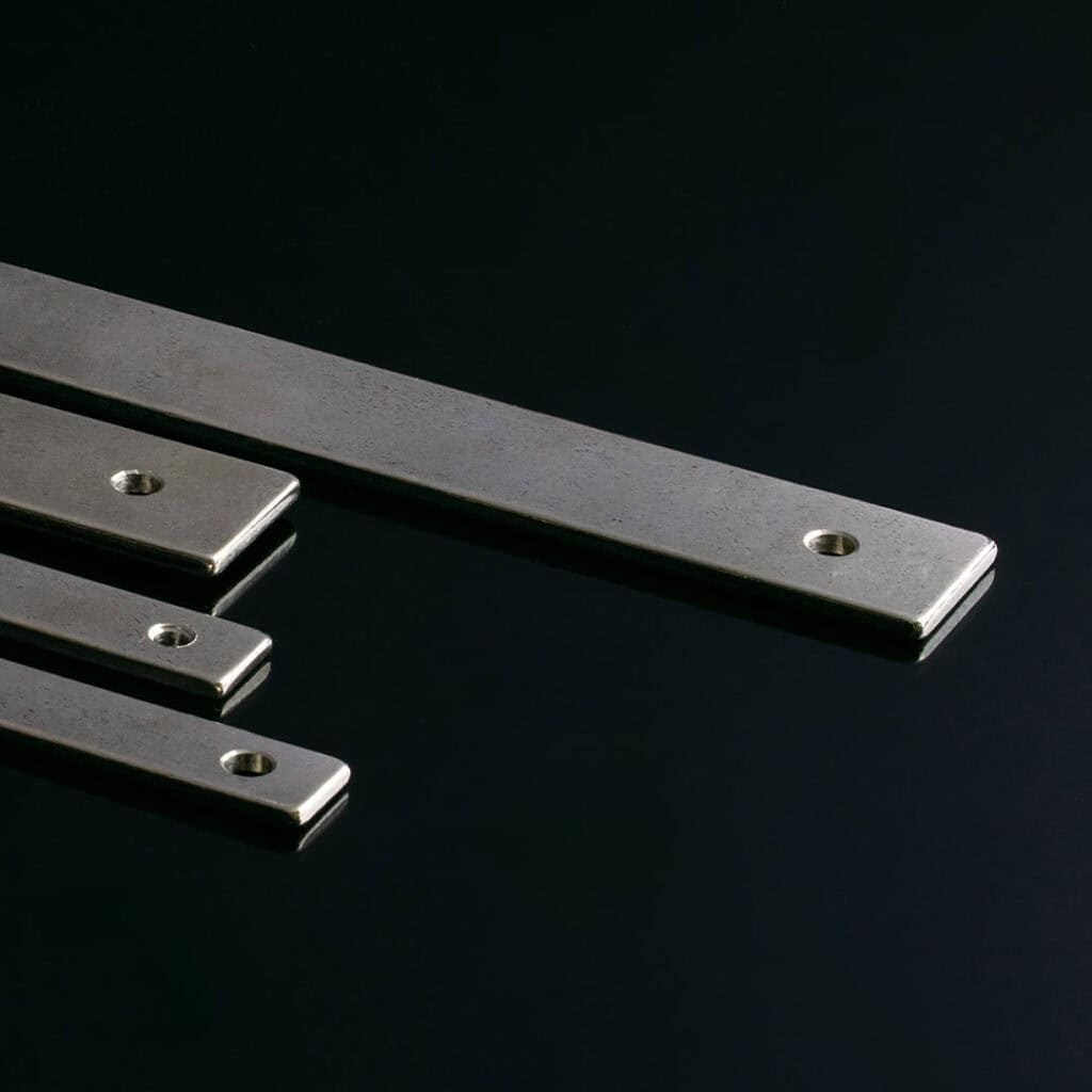 Featured image showing the Vinci Cabinet Hardware Collection by Schaub on a black background.