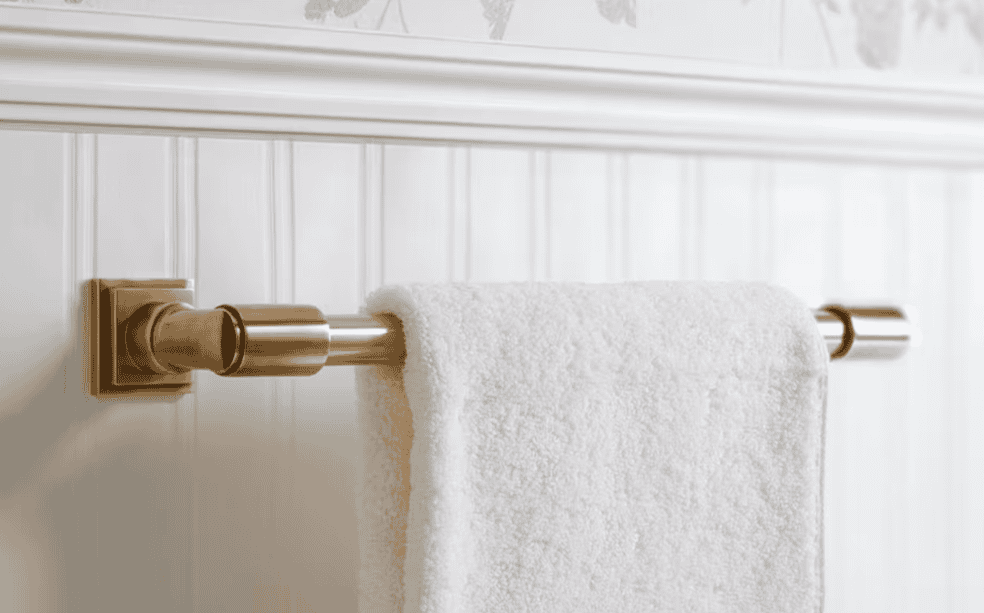 Featured image showing Emtek's new Small Rosette Bath Hardware paired with a towel bar in a beautiful brass finish.