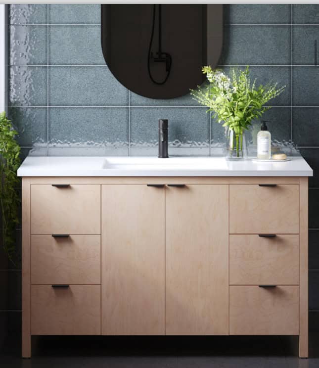 48" Freestanding Bathroom Vanity from DM Bath shown with Slab doors and drawers in Whitewash Maple Stain finish, undermount sink.